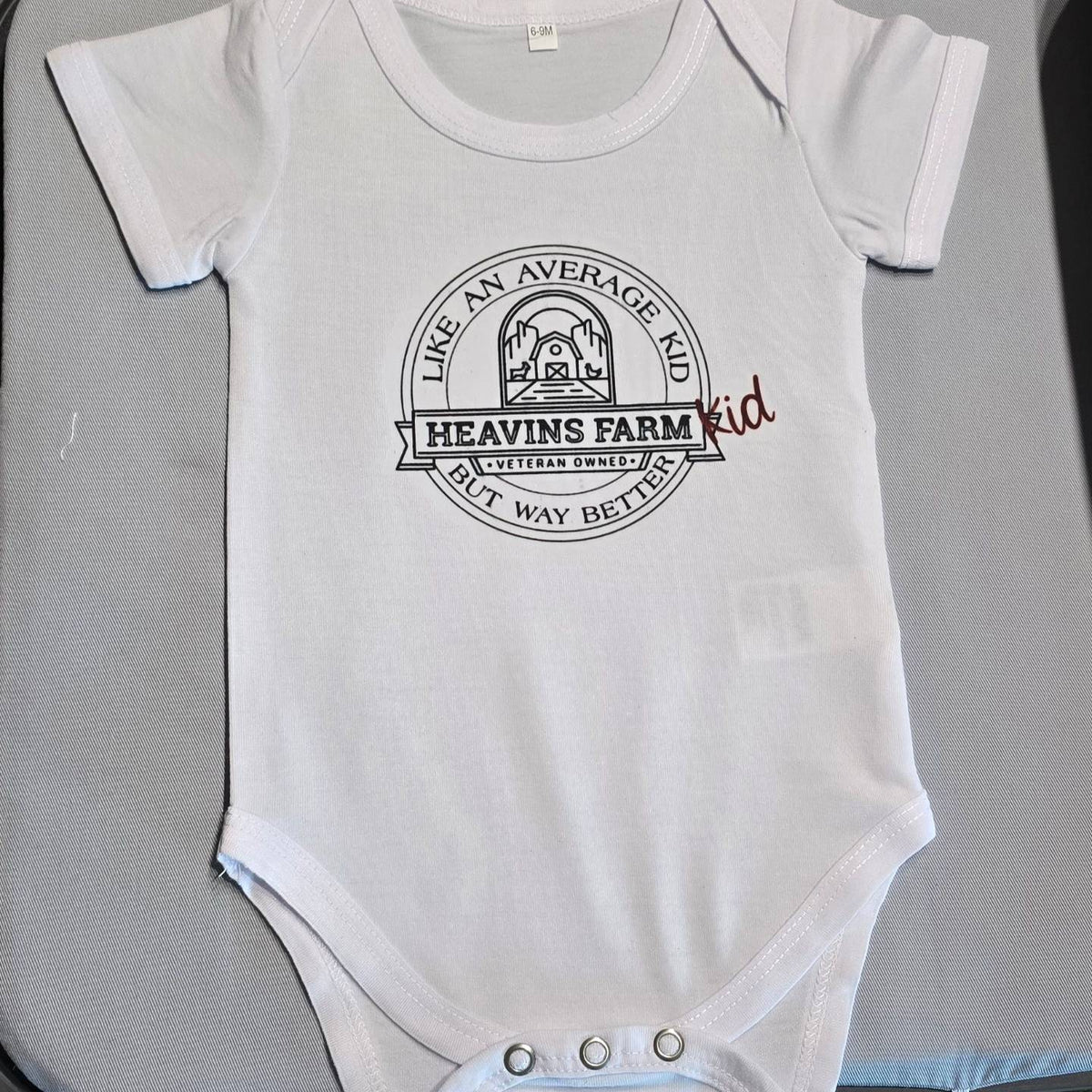 Baby Onesie (Heavin's Farm Kid)